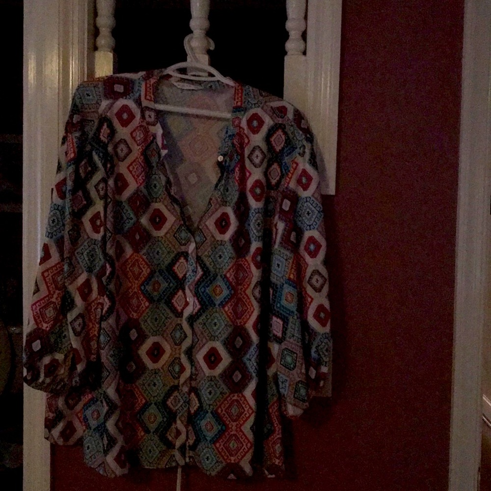 Multi-colored prints on pink and teal tops.
